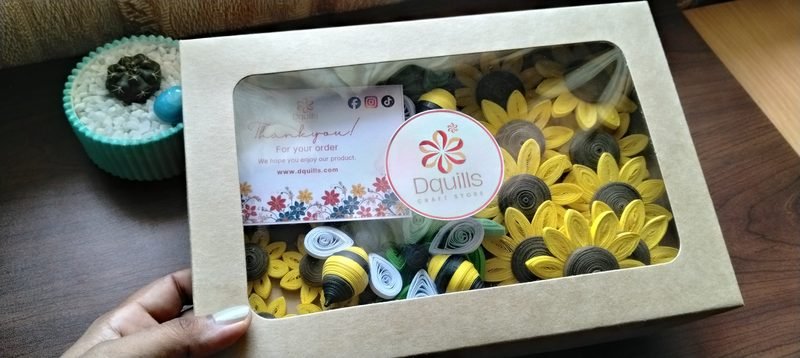 Quilled paper art by Dquills